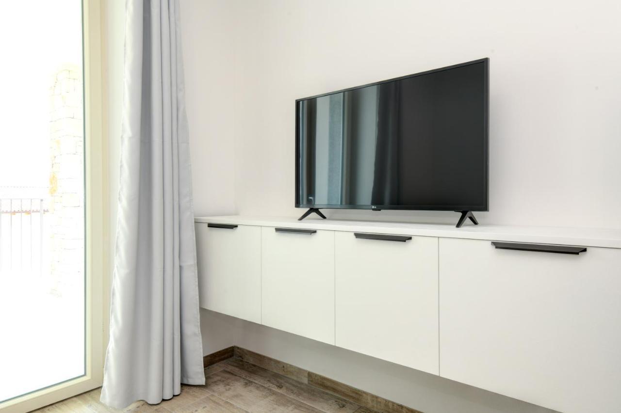 Borgo Ermanno Aparthotel ติญญาเล ภายนอก รูปภาพ