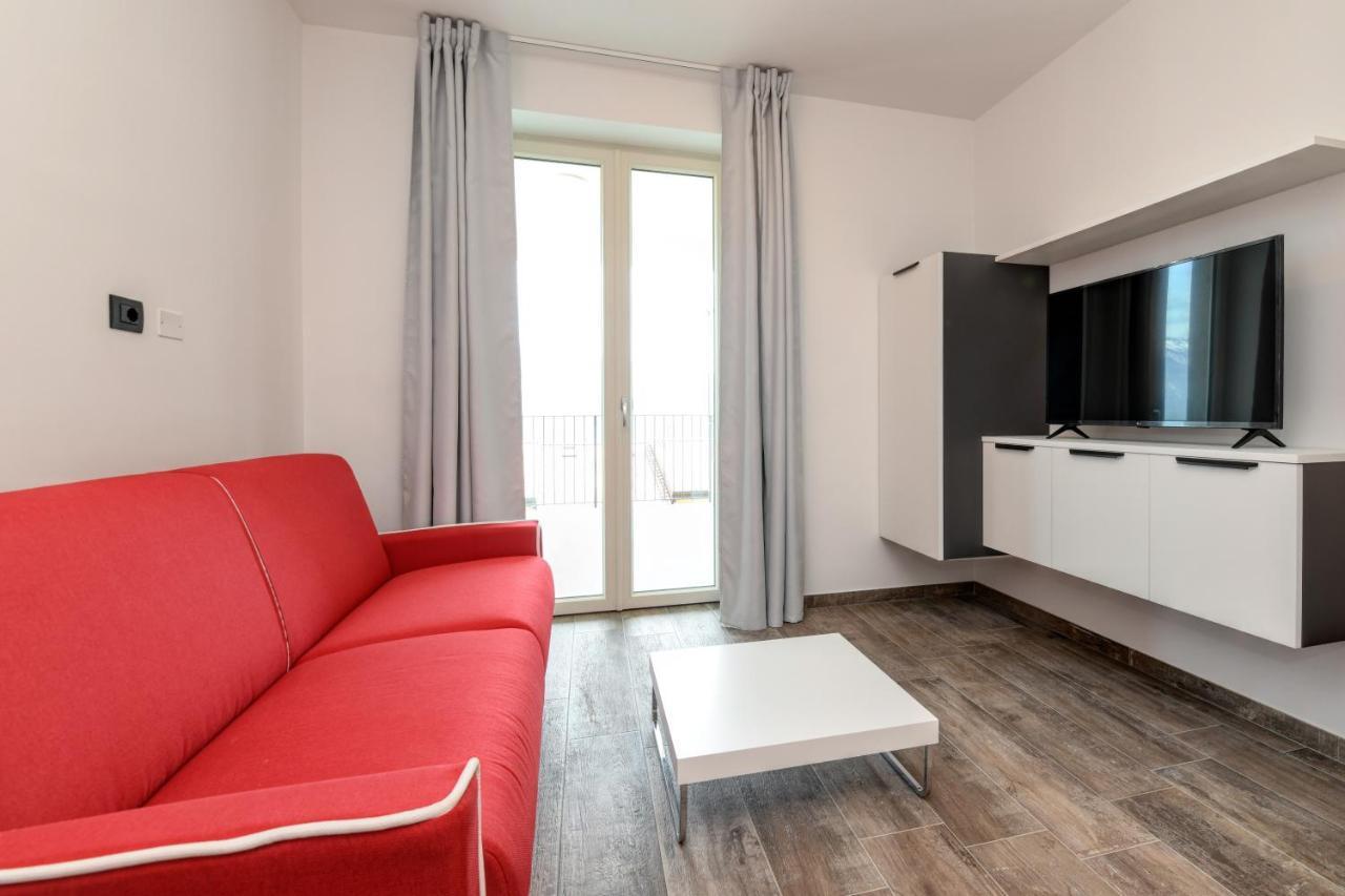 Borgo Ermanno Aparthotel ติญญาเล ภายนอก รูปภาพ