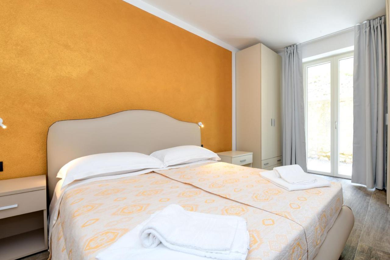Borgo Ermanno Aparthotel ติญญาเล ภายนอก รูปภาพ