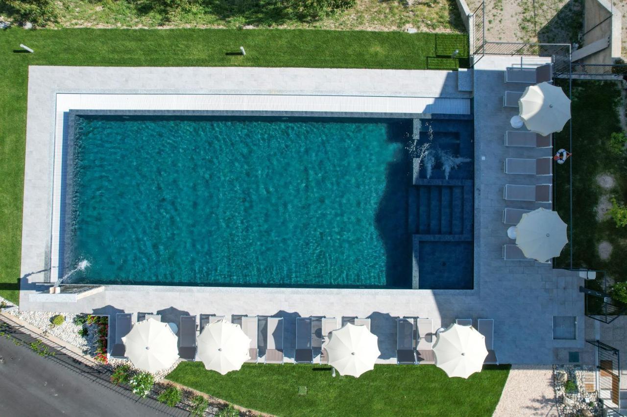 Borgo Ermanno Aparthotel ติญญาเล ภายนอก รูปภาพ